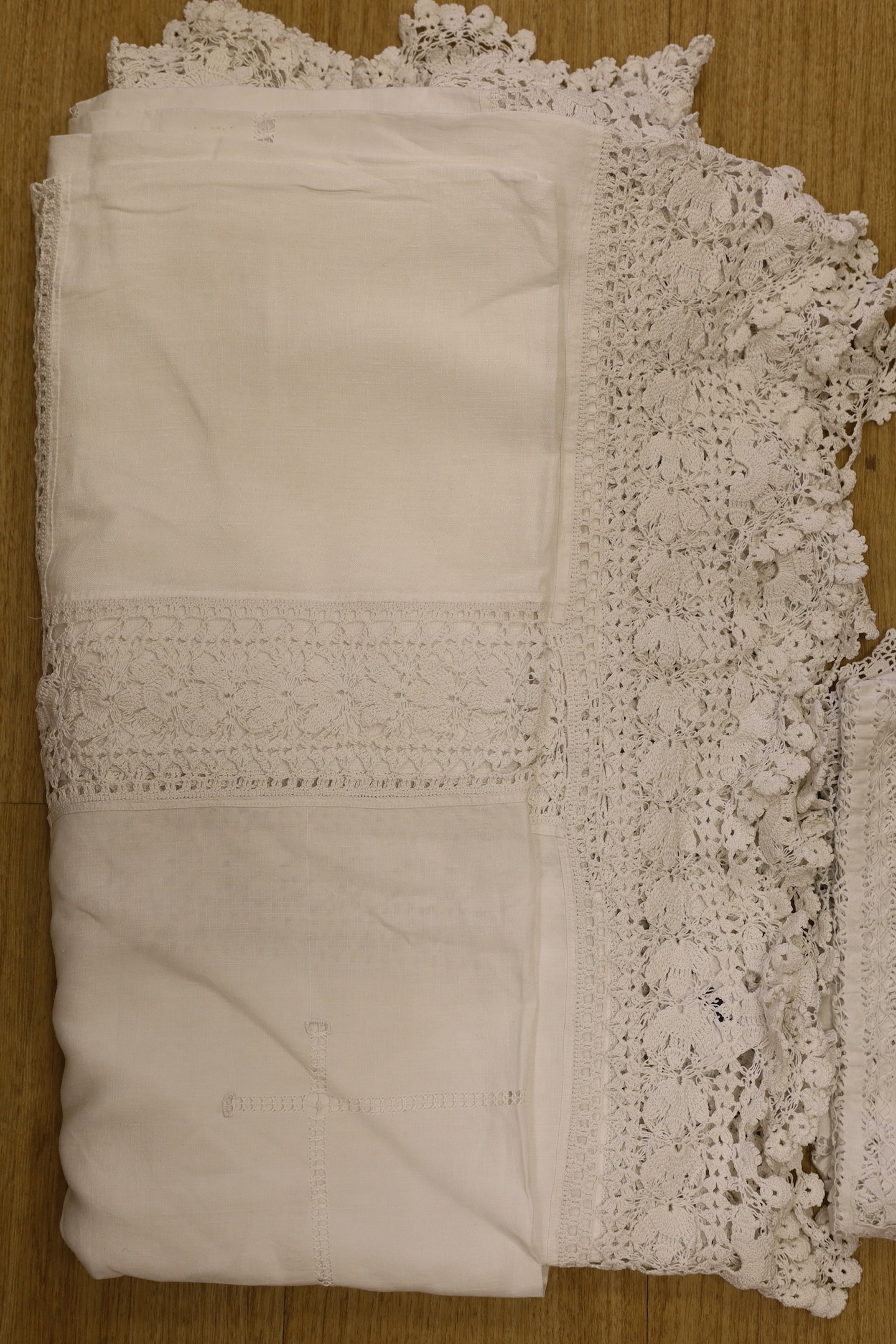 A group of lace table cloths